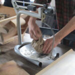 Weighing out the dough for each loaf